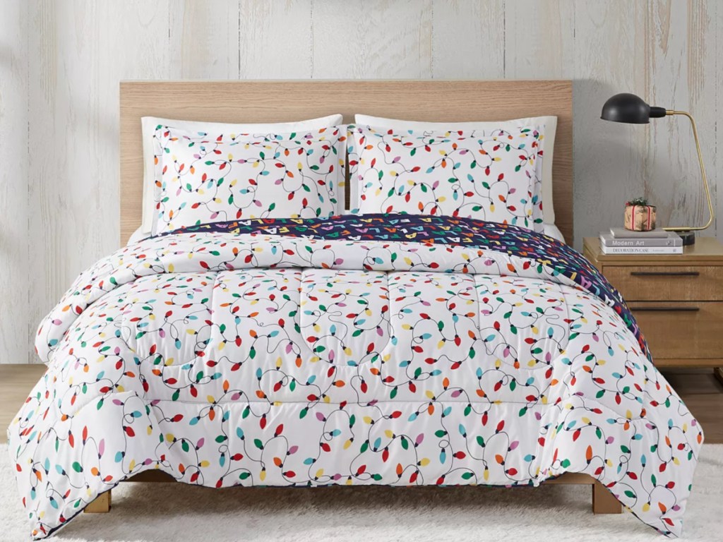 christmas themed Falala comforter on bed