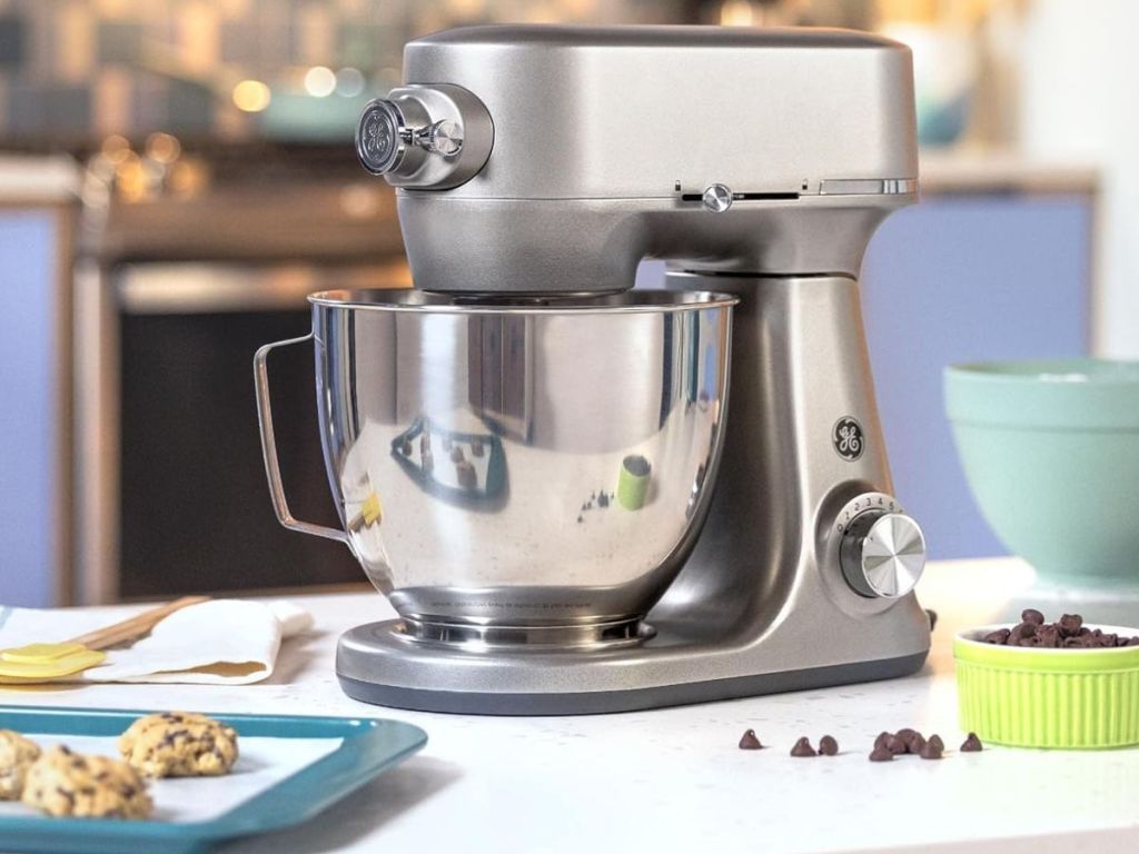 GE Stand Mixer next to a tray of unbaked cookies