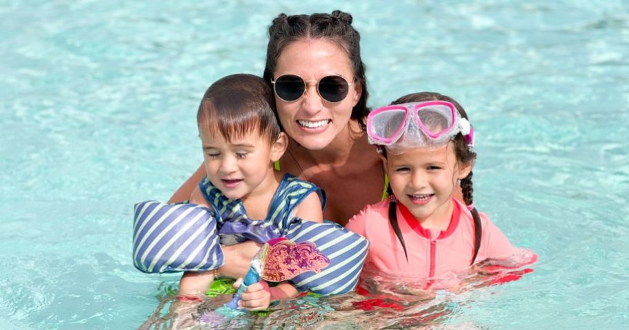 woman and two kids in pool