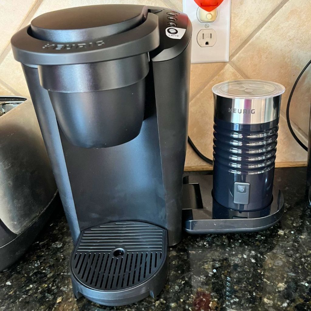 Keurig K Latte machine sitting on counter in kitchen