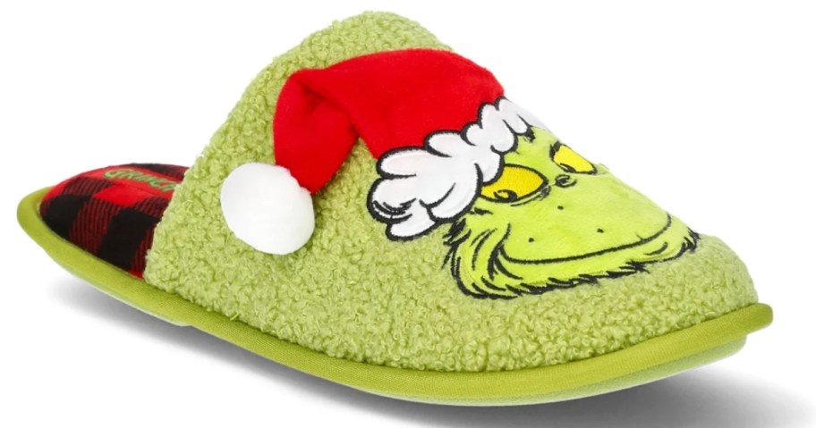 a green slipper with The Grinch in a Santa hat on it