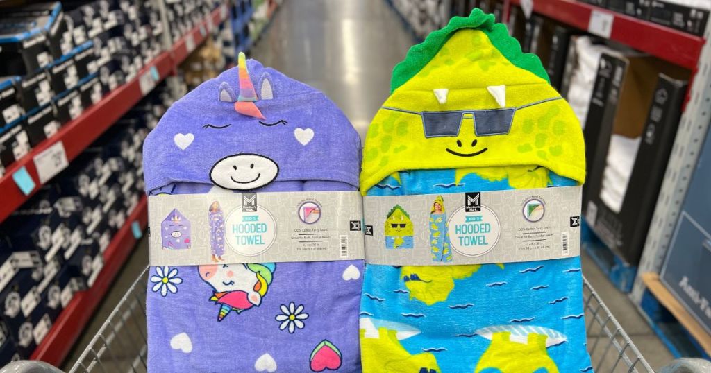 sam's club shopping cart with 2 kid's hooded animal towels - unicorn and dino