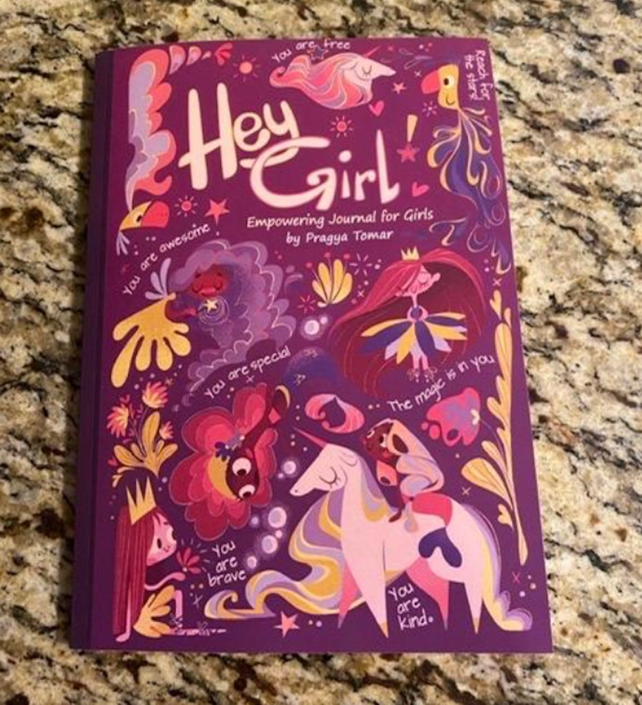 hey girl journal sitting on granite countertop