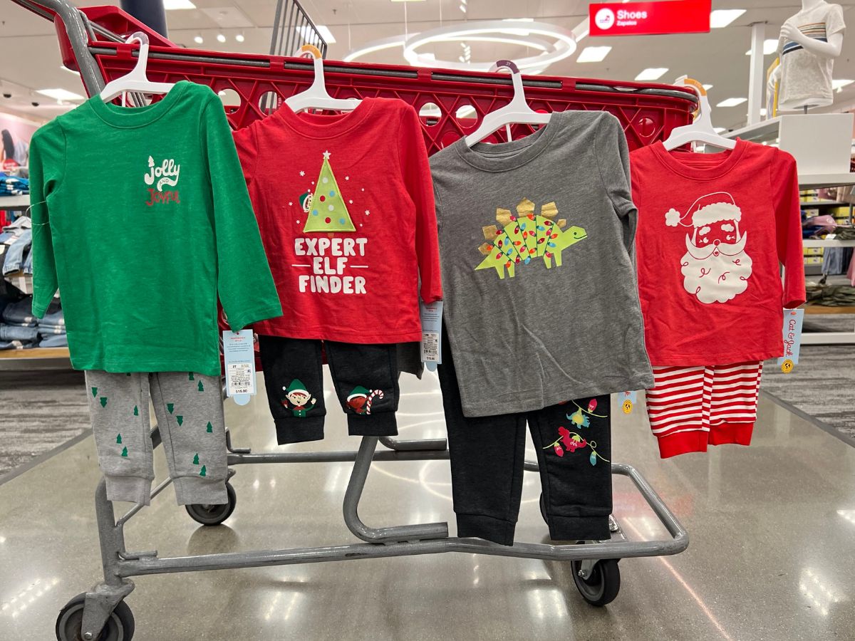 Toddler Christmas Clothes sets at Target hanging on a cart