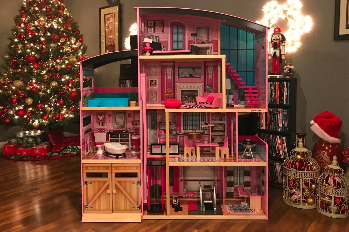 KidKraft Wooden Dollhouse Shimmer Mansion assembled infront of a christmas tree