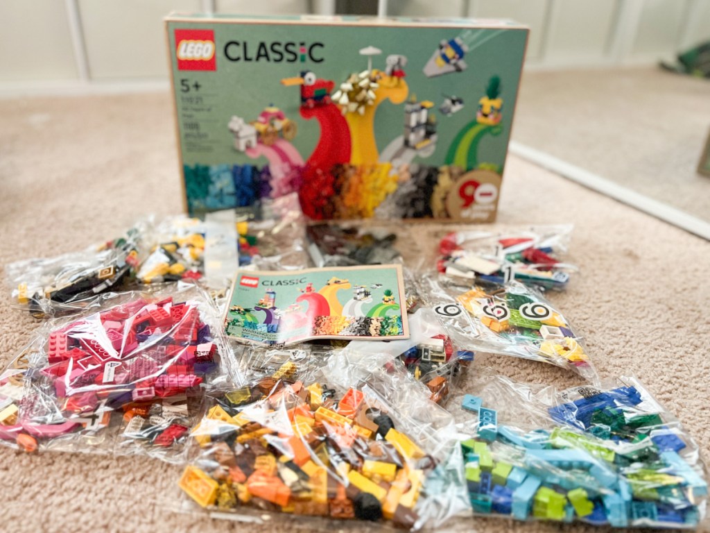 bags of LEGOS next to box