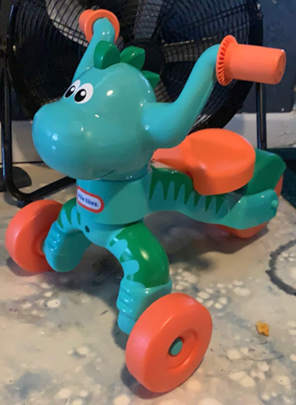 close up of blue Little Tikes Go & Grow Dino Foot to Floor Dinosaur Tricycle 