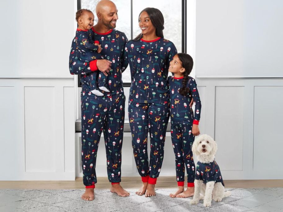 family wearing Member's Mark Matching Family Pajama sets