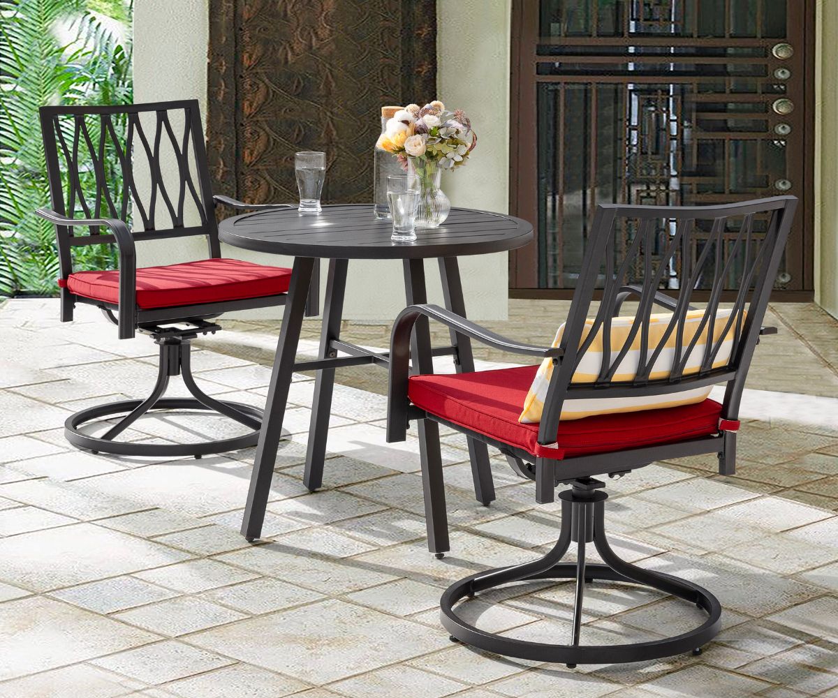 Nuu Garden 2 Black with Gold Speckles Iron Frame with table on a patio behind a house