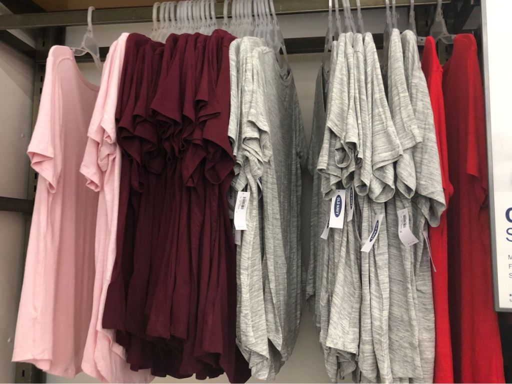 women's tops and tees hanging on a rack at Old Navy