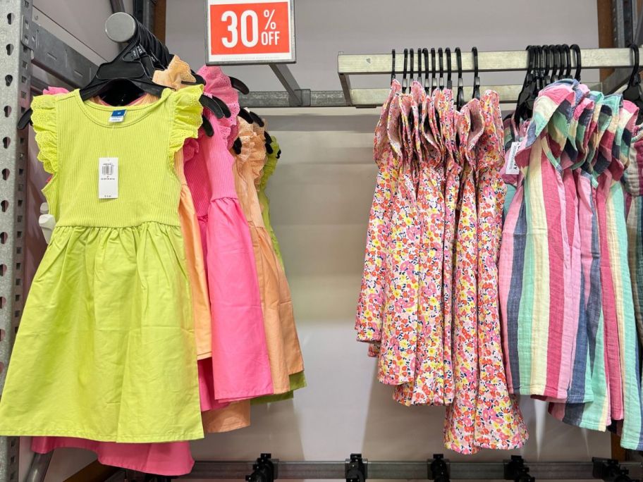 Toddler Dresses hanging up on display at Old Navy