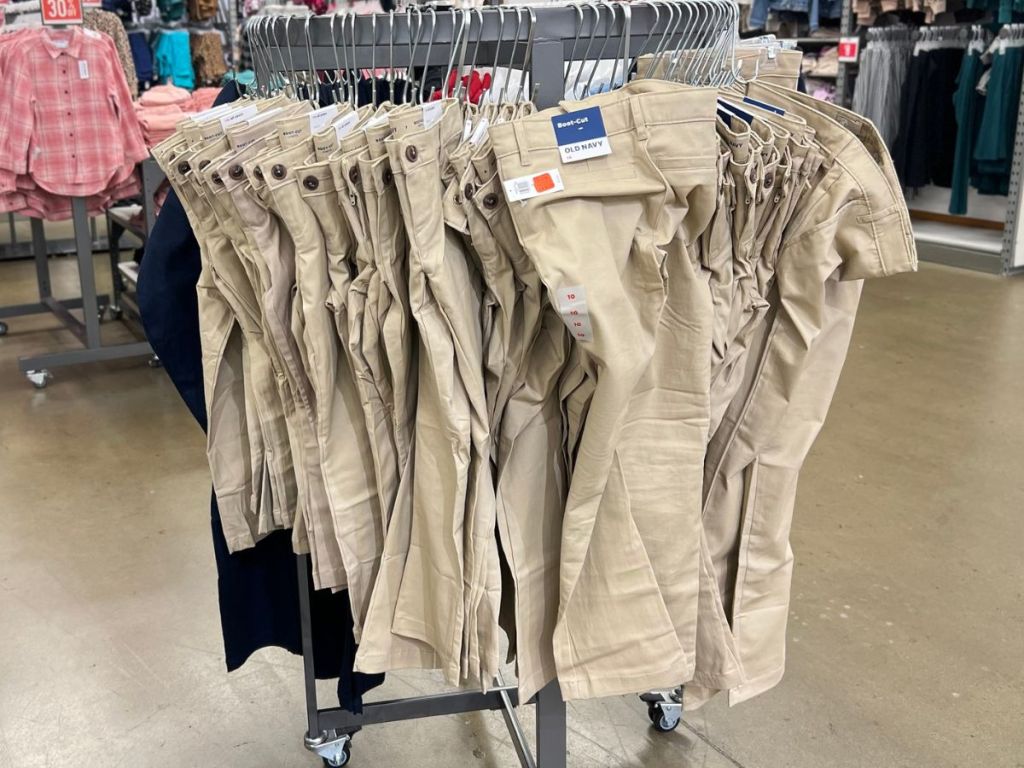 A rack of Girls pants at Old Navy