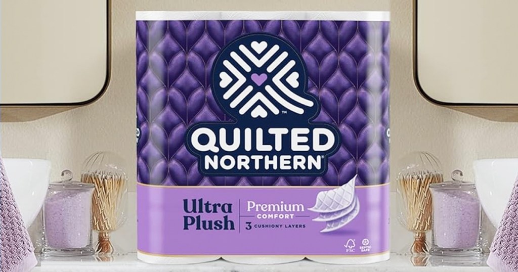 purple pack of Quilted Northern Ultra Plush Toilet Paper on bathroom counter