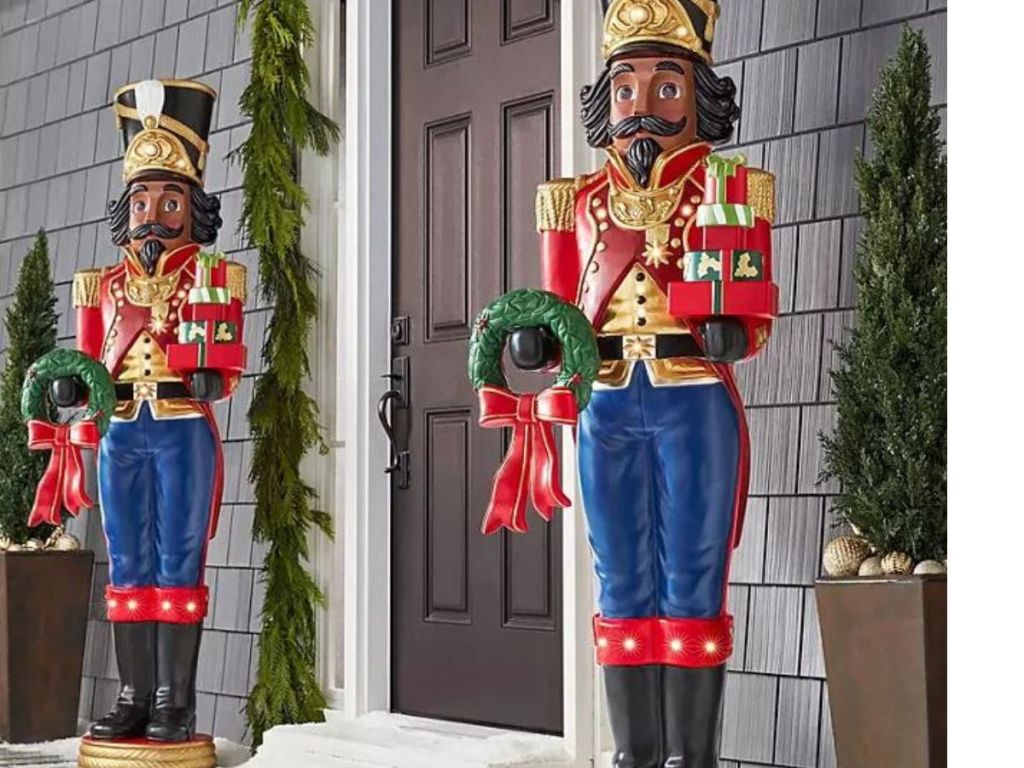 Two giant nutcrackers set outside a doorway