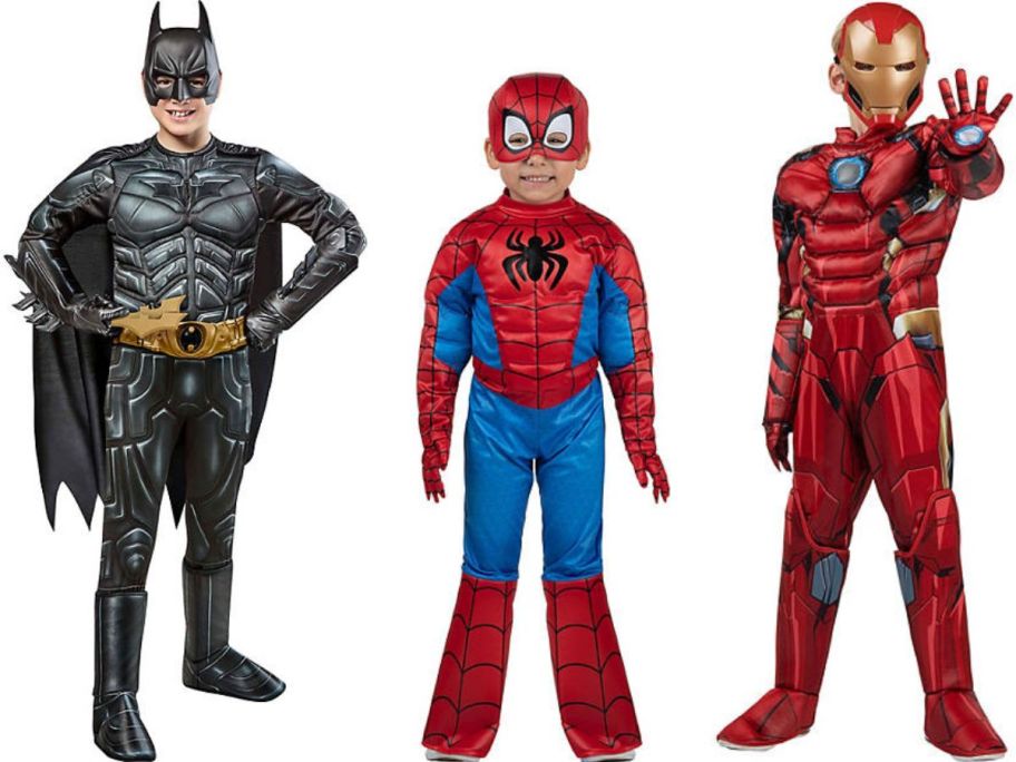 Stock images of boys wearing Batman, Spiderman and Iron Man Halloween Costumes