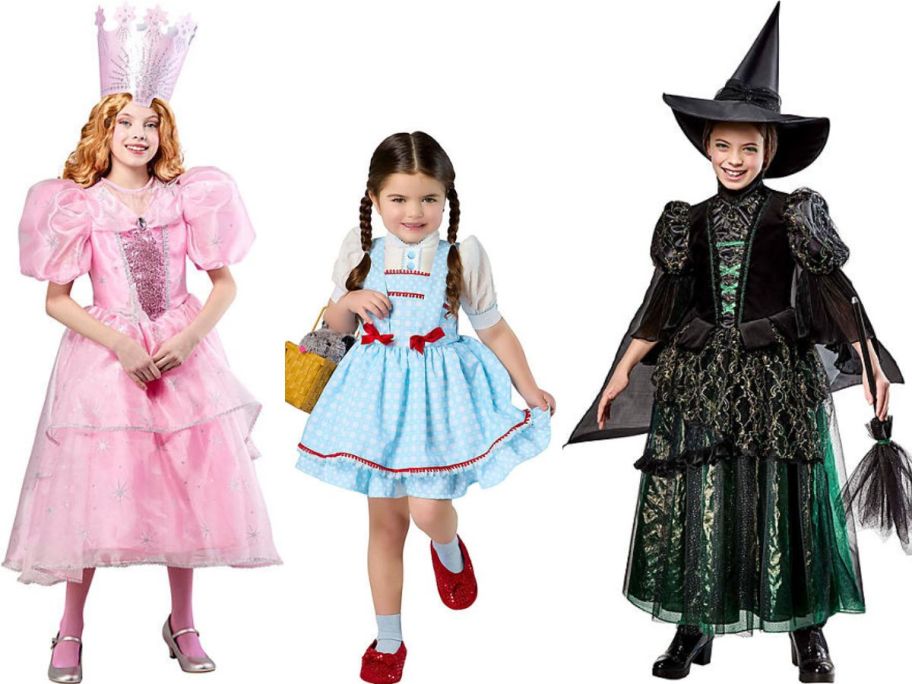 Stock images of girls wearing Glinda, Dorothy and Wicked Witch Costumes from The Wizard of Oz