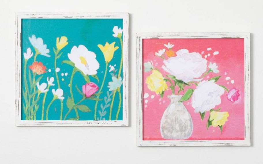 a pair teal and pink framed floral prints