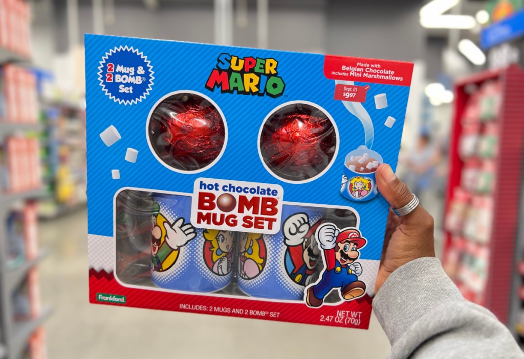Hand holding up a box of Super Mario Chocolate Bombs