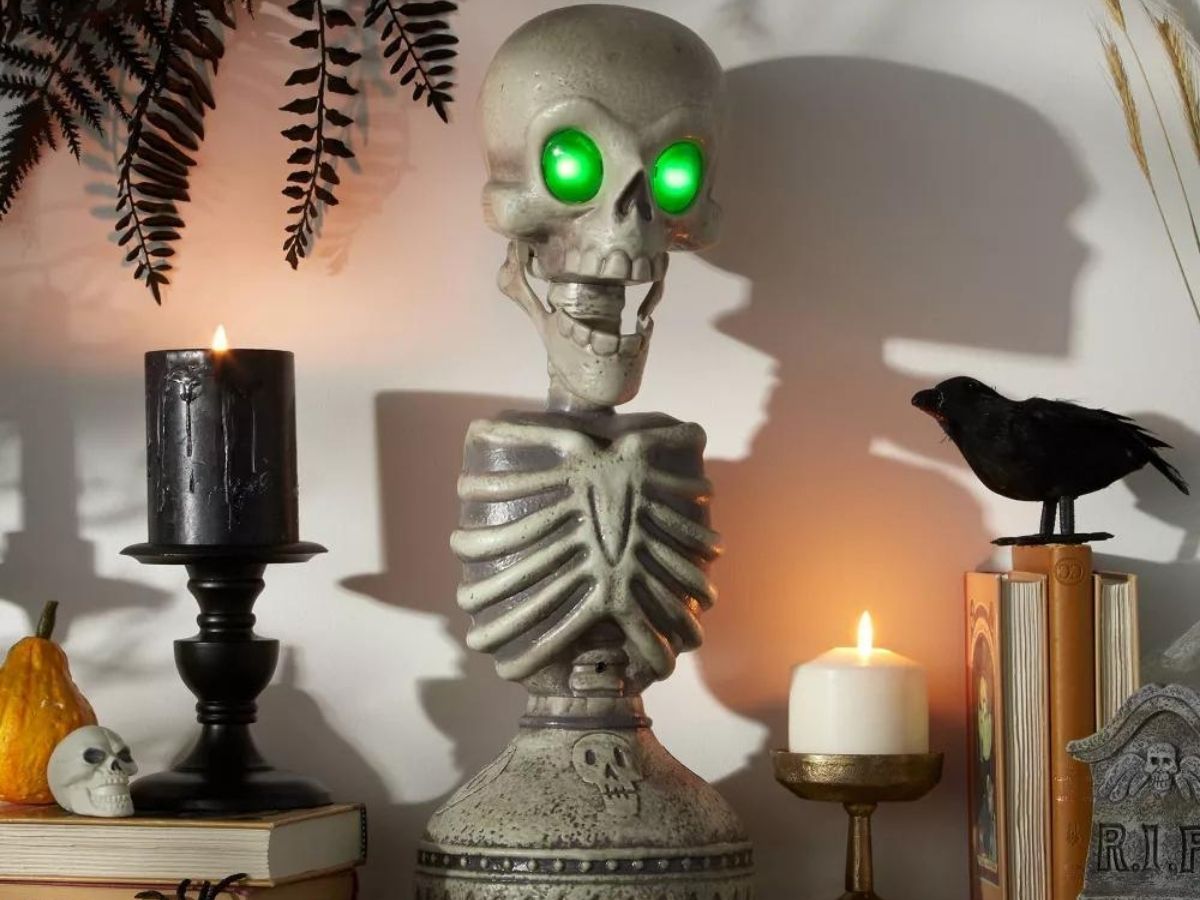 Light up skeleton bust Halloween decoration on a mantel