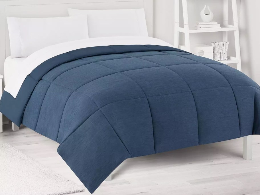 navy blue comforter on bed