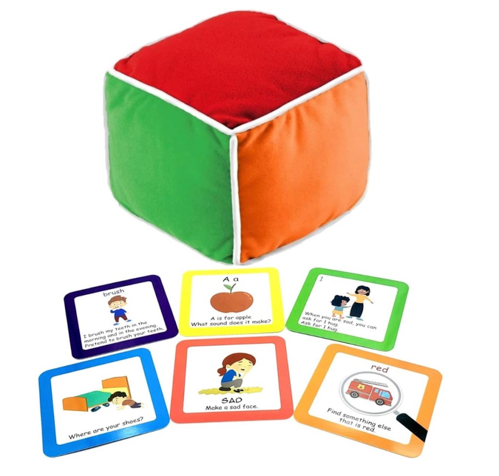 stock photo of colorful cube and learning cards on white background