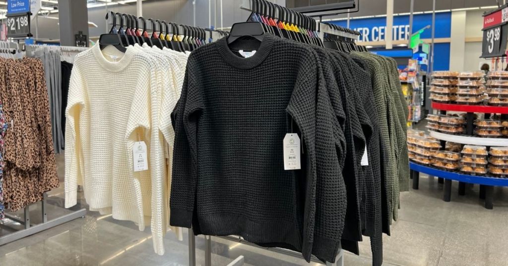 white and black Long Sleeve Waffle Crewneck Pullover Sweaters hanging in walmart