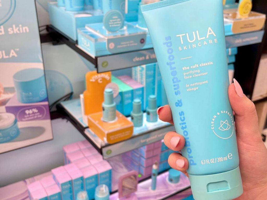 Hand holding Tula The Cult Classic Cleanser