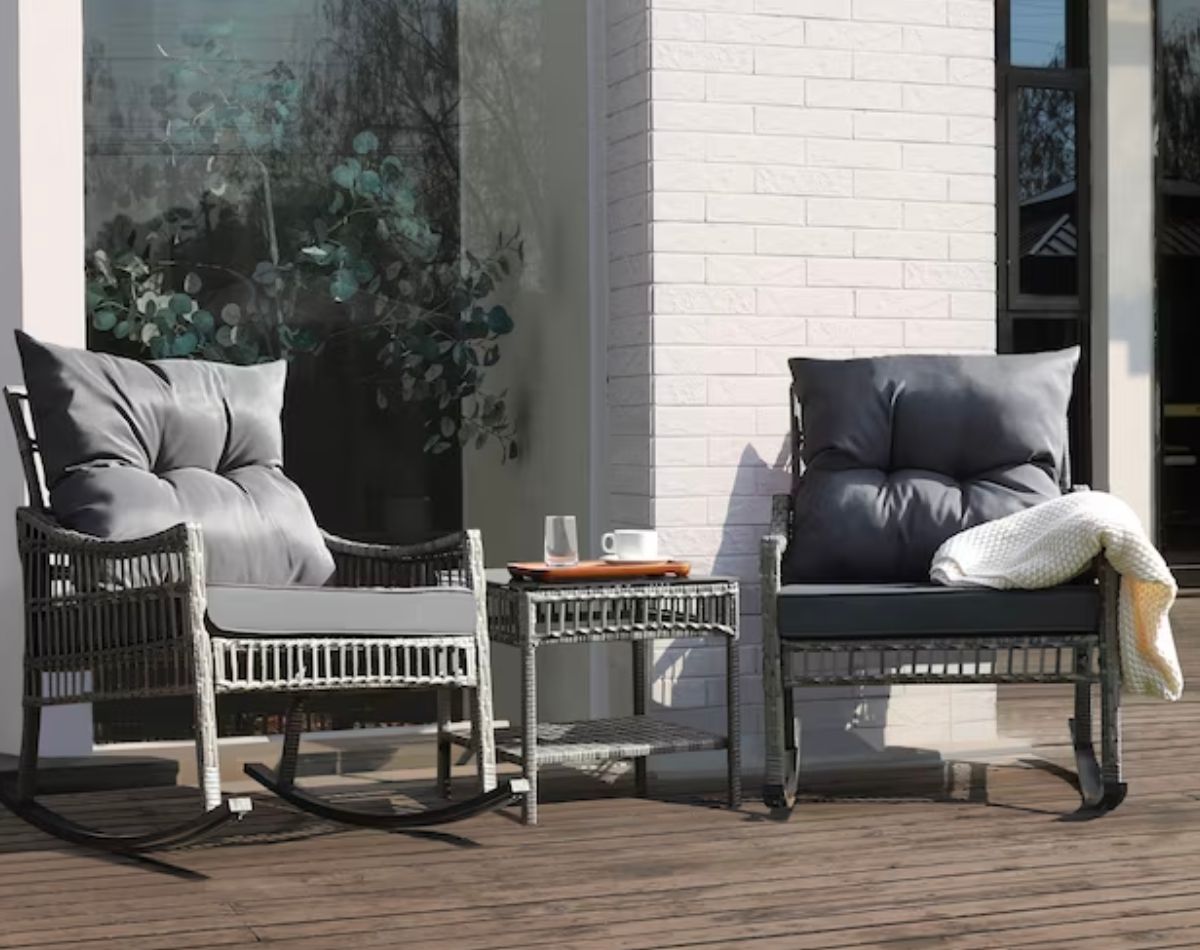 VEIKOUS 3-Piece Wicker Patio Conversation Set with Cushions on a patio behind a house