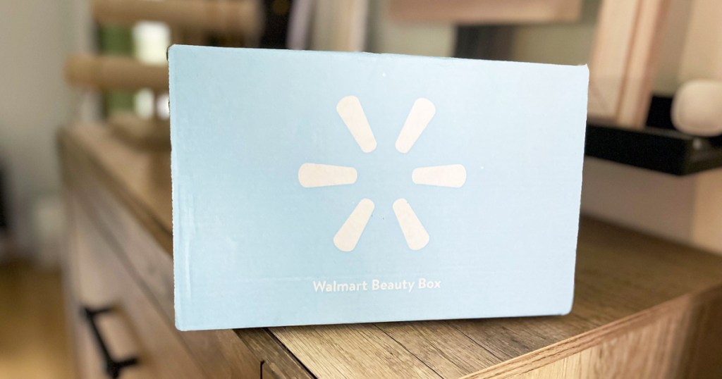 light blue walmart beauty box on wood dresser