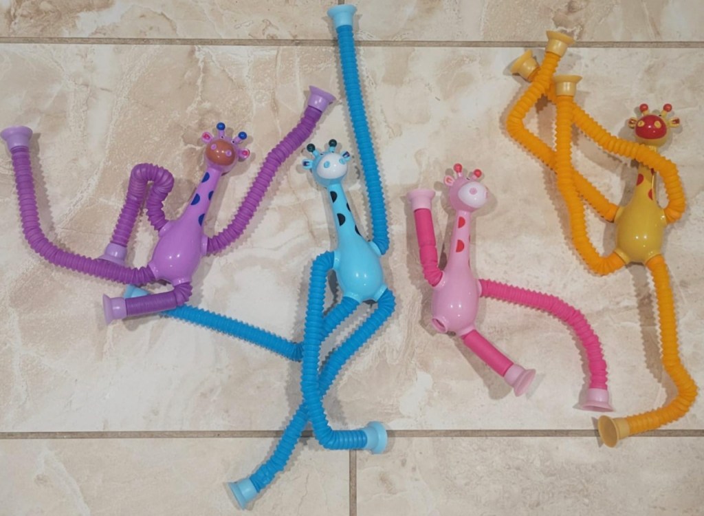 different colored bendable giraffe toys