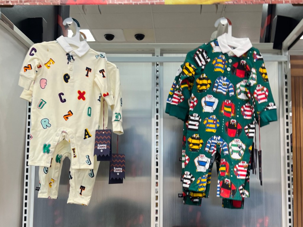 alphabet and green Rowing Blazers x Target baby clothes displayed at the store