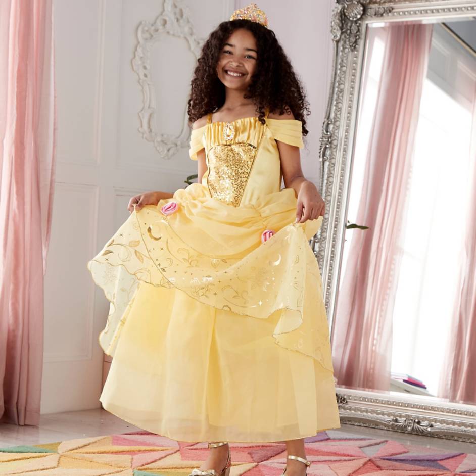 young girl wearing a disney belle beauty and the beast costume