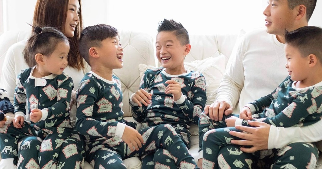 family wearing green matching christmas pajamas