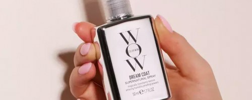 hand holding color wow dream coat spray