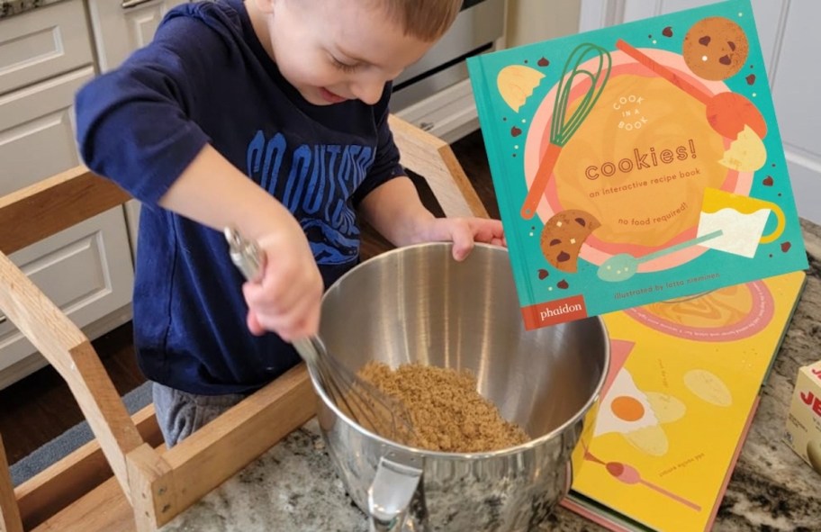 boy mixing batter in bowl with cookies recipe book