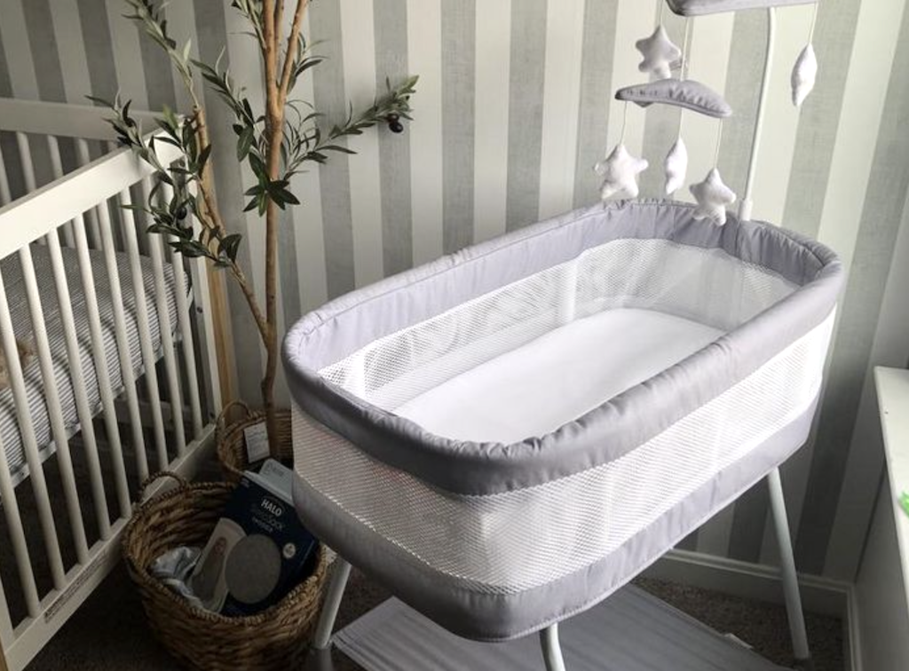 Crib and bassinet in baby room 