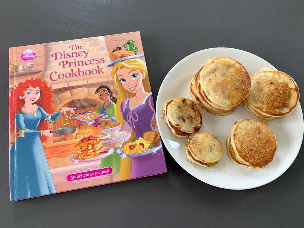 Disney Princess cookbook with pancakes on plate 