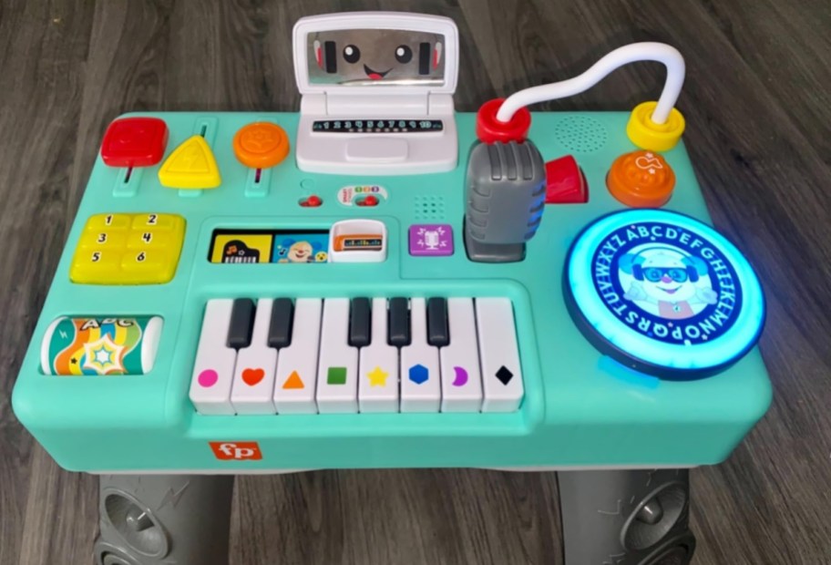 fisher price DJ booth displayed standing on the floor