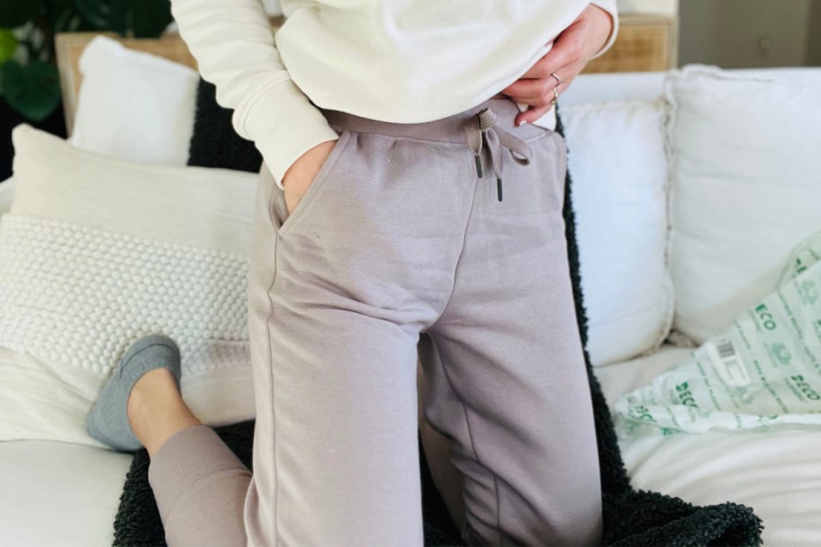 woman in drawstring mauve sweatpants