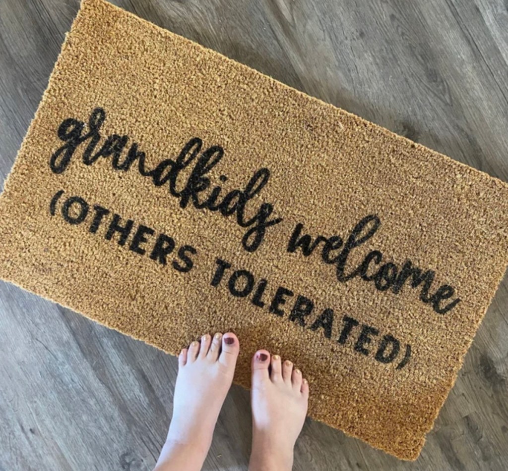feet in front of grandkids welcome others tolerated doormat