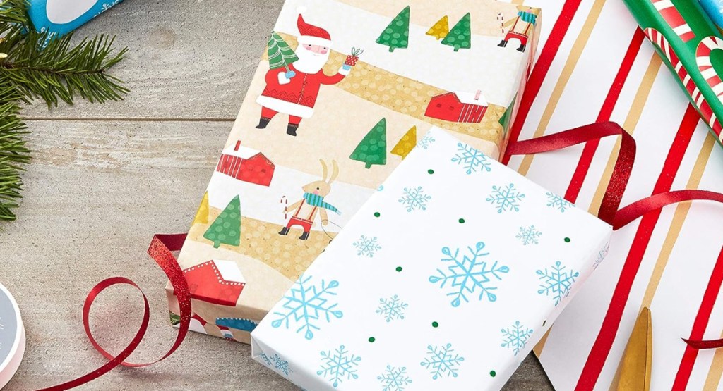 hallmark wrapping paper displayed under the tree