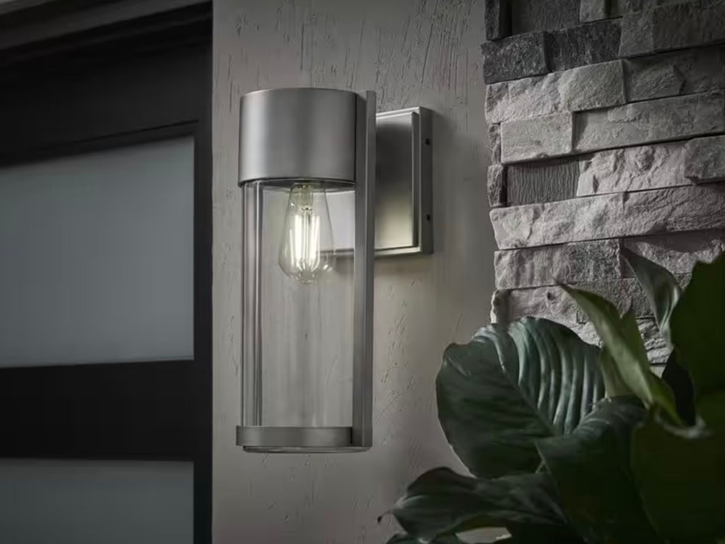 silver outdoor light on wall