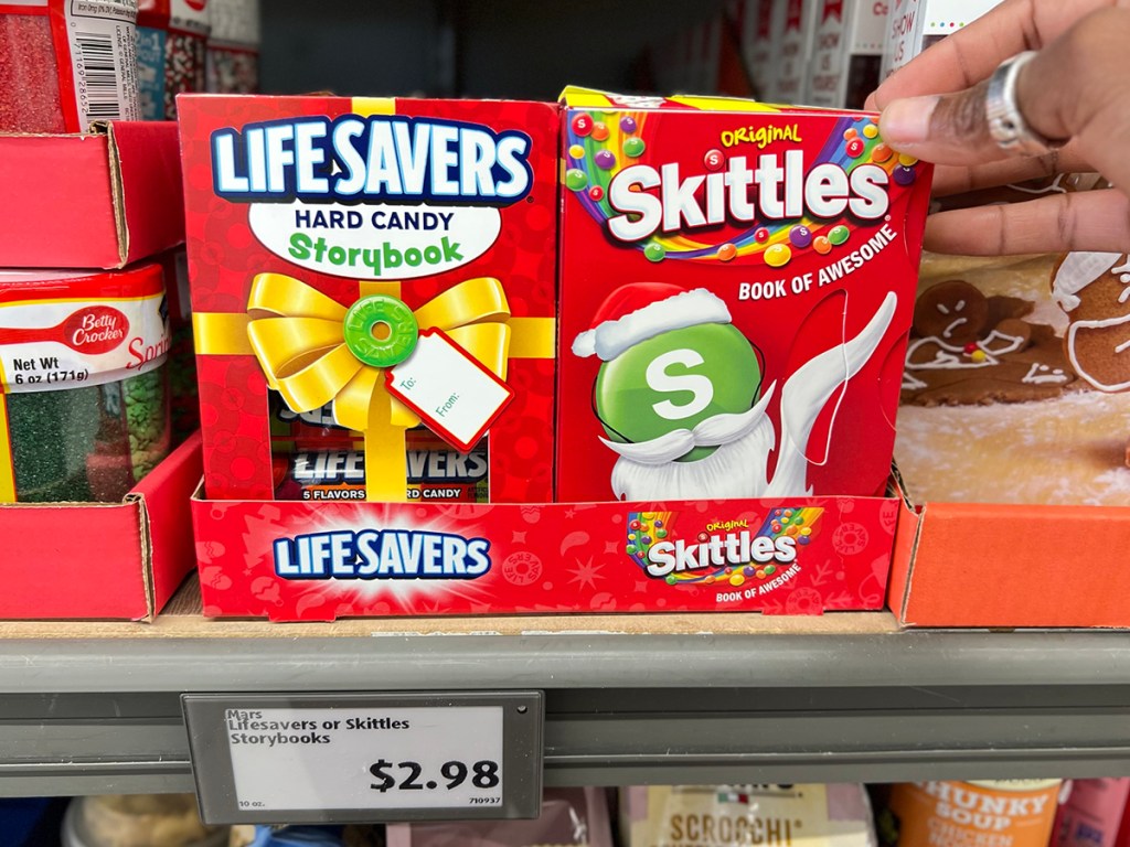 Mars Lifesavers or Skittles Storybooks on shelf in store
