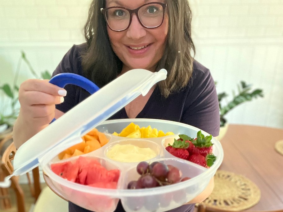 lina holding locknlock tray full of fruits