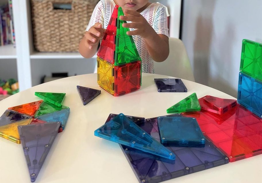 magnetic tiles on table with kid building 