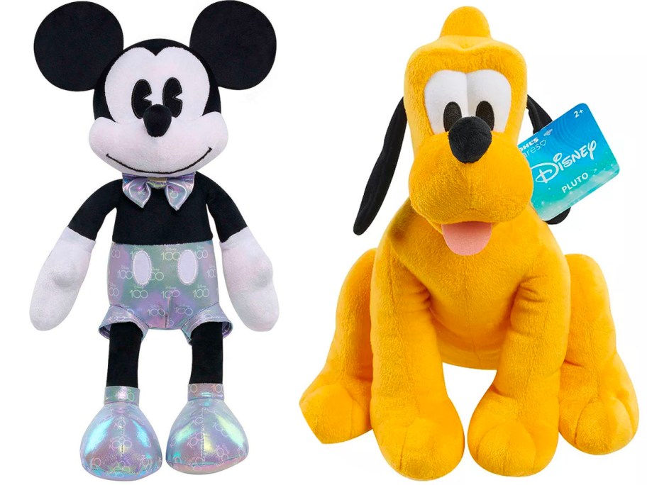 mickey mouse and pluto plush toys stock image