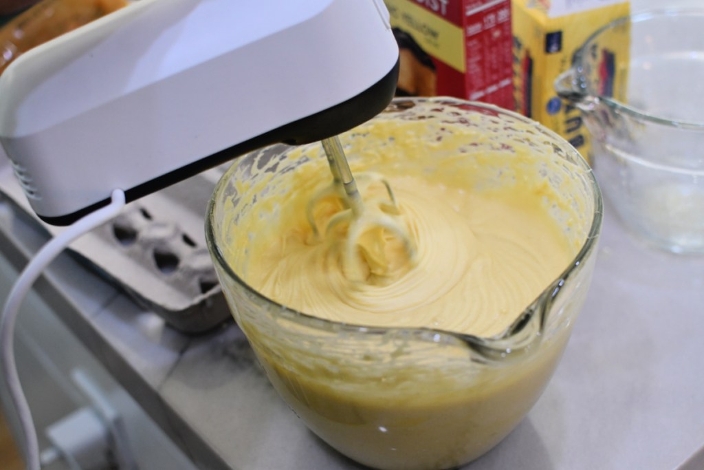 mixing yellow cake batter for cupcakes