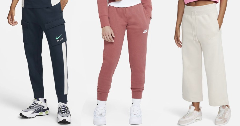three people wearing navy, pink and white nike pants and sneakers
