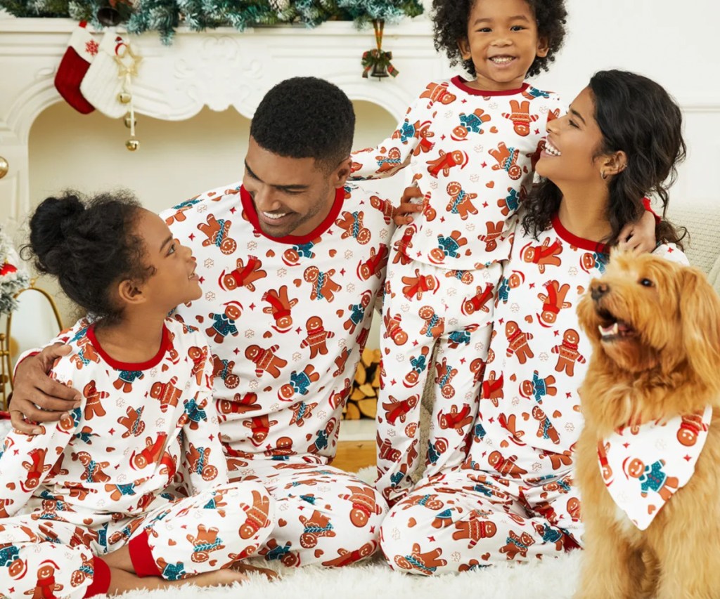 family wearing gingerbread pajamas