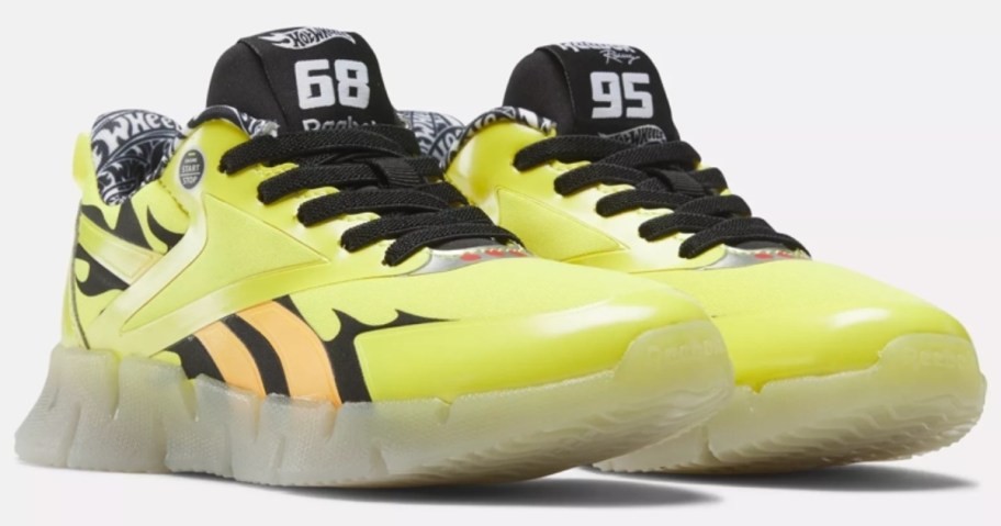 yellow, black with flames kid's Reebok shoes